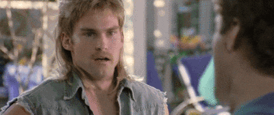 A guy with an old-school haircut saying "Yes! That is awesome!"